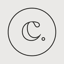 over the c. logo